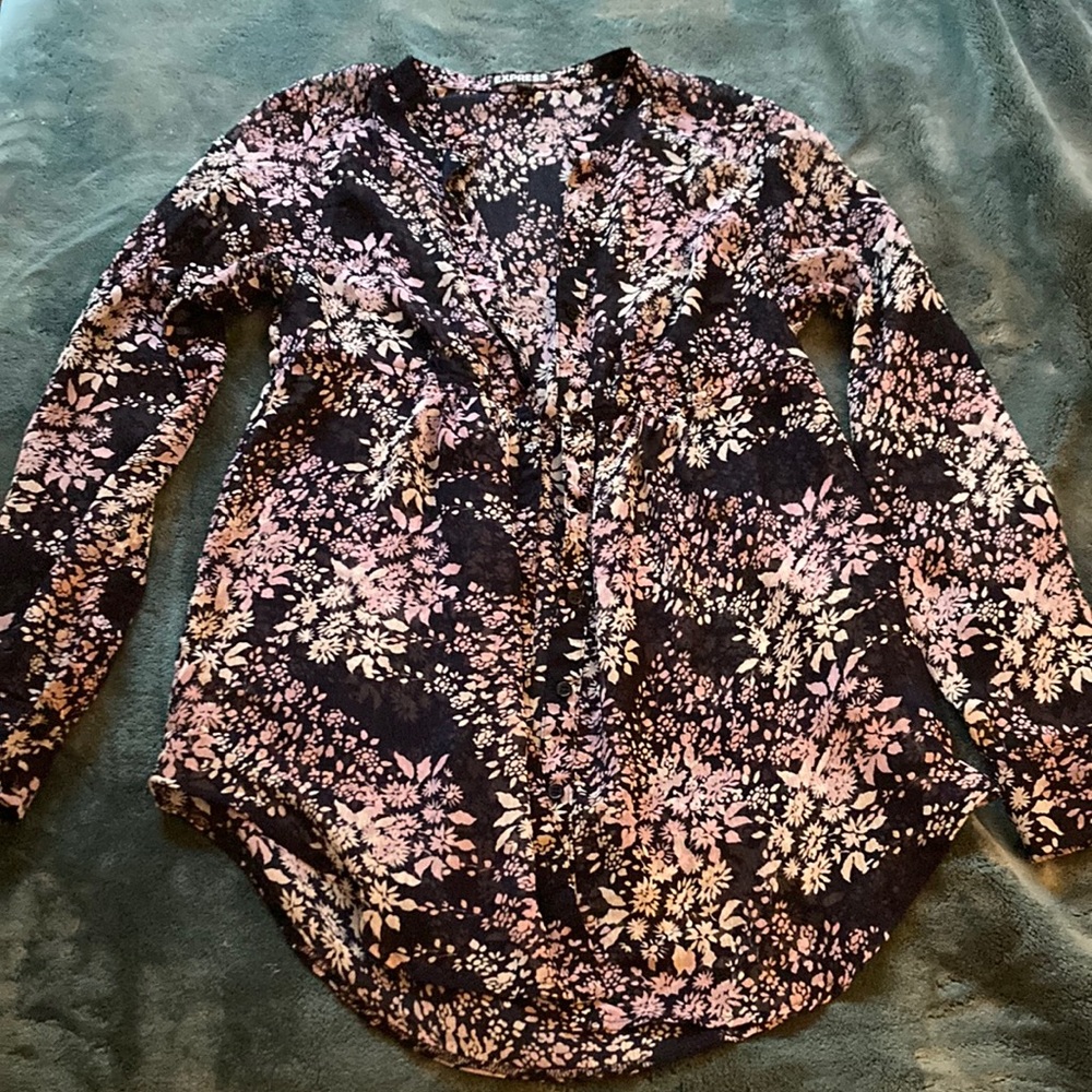 Womens button up blouse.  Yes it’s see thru